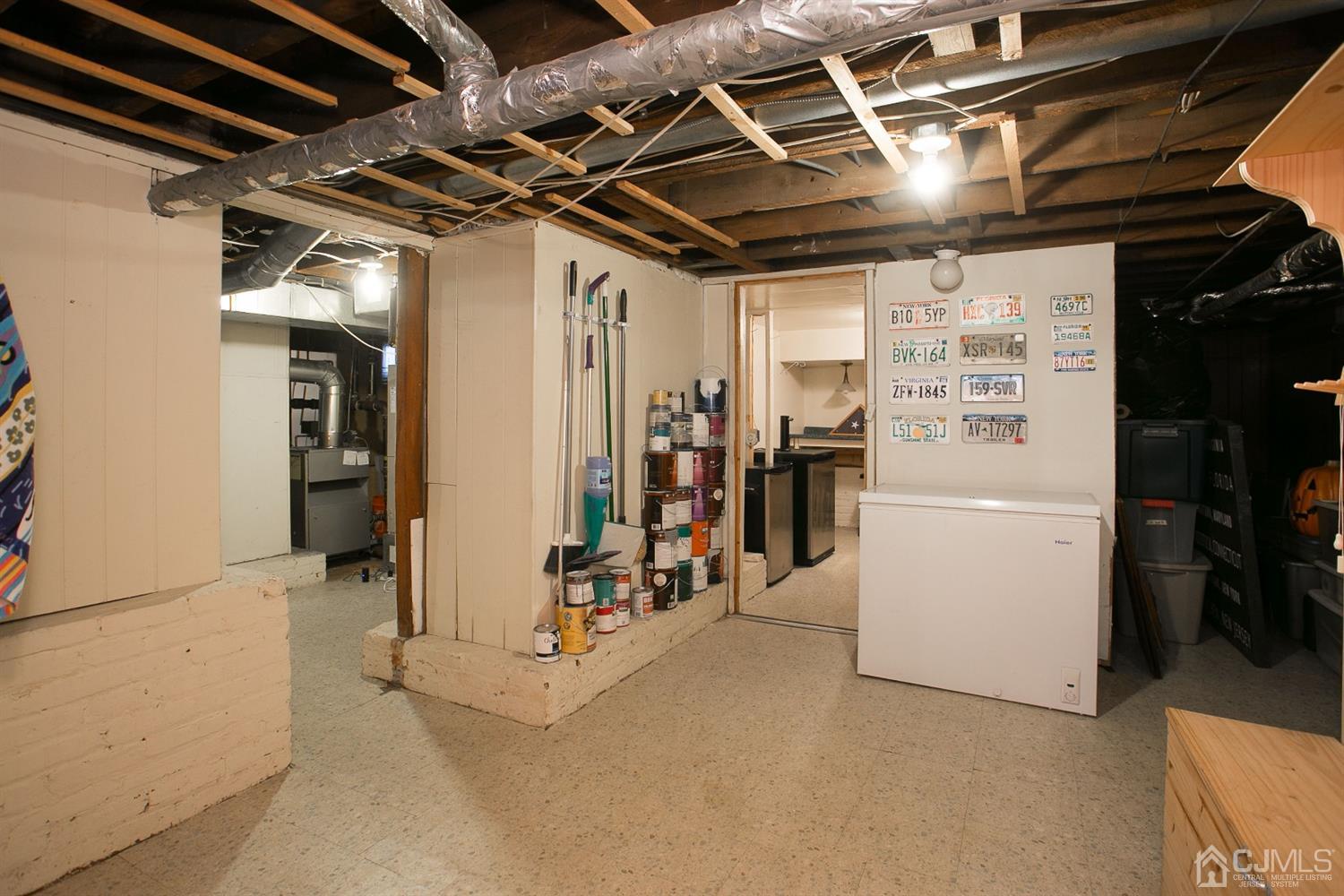 68 Rector Street Metuchen, NJ 08840 - Photo 35 of 40 a view of a refrigerator with storage and utility