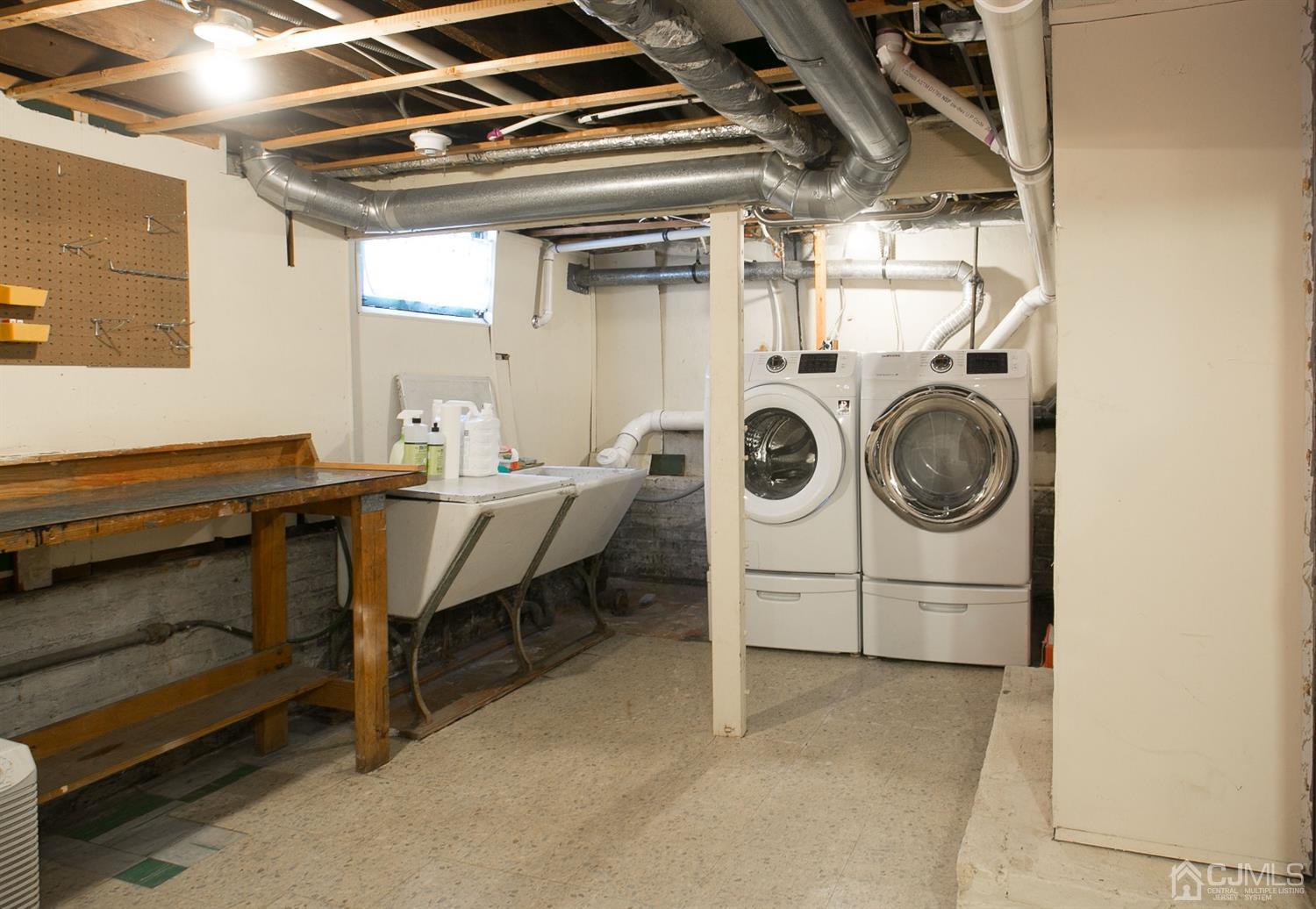 68 Rector Street Metuchen, NJ 08840 - Photo 37 of 40 a utility room with dryer and washer