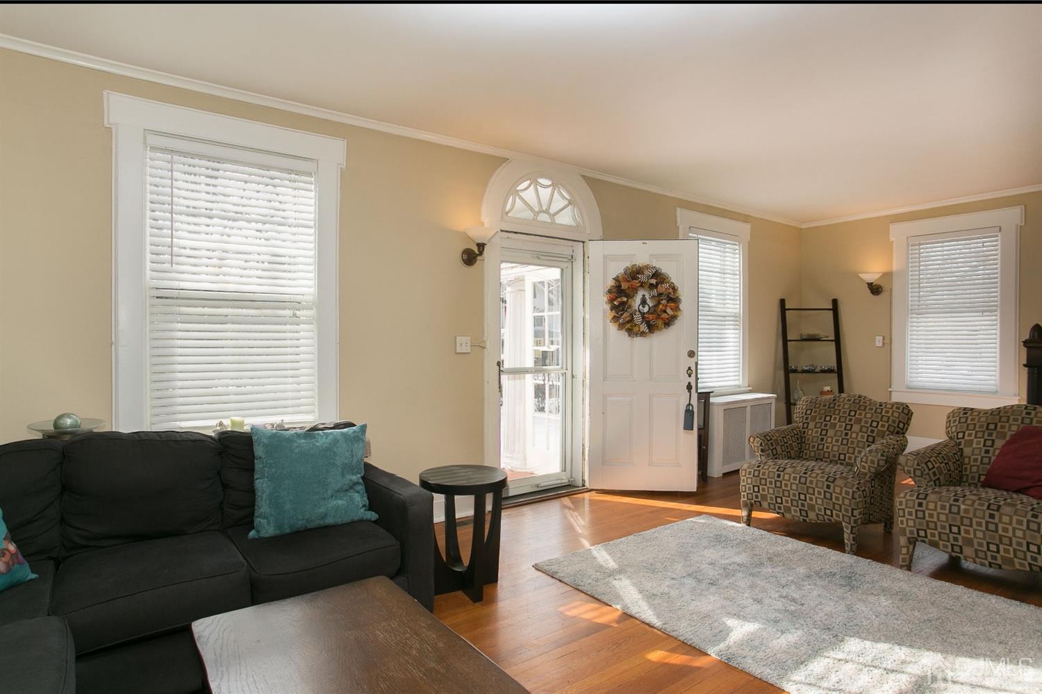 68 Rector Street Metuchen, NJ 08840 - Photo 7 of 40 a living room with furniture and a large window
