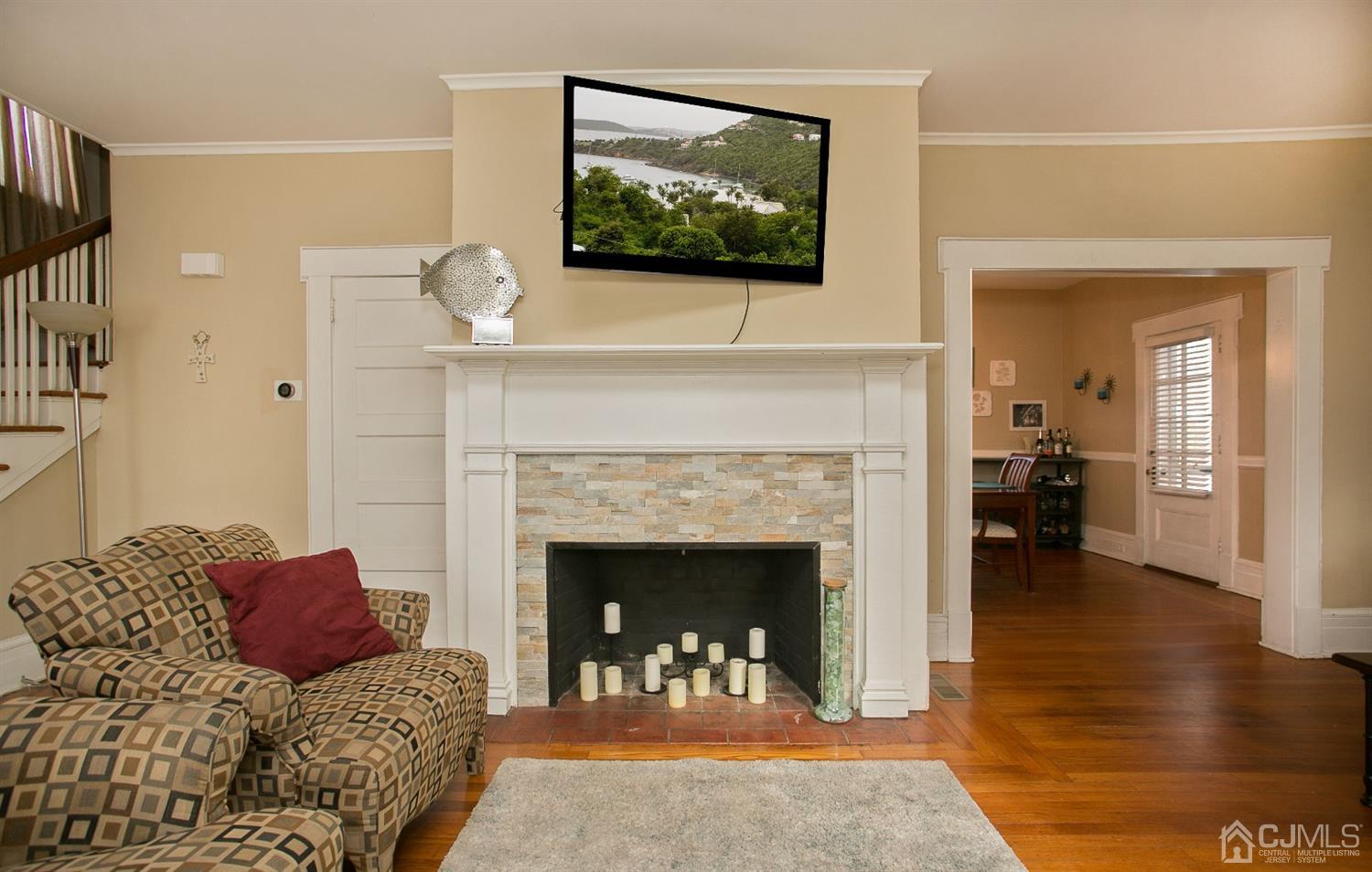 68 Rector Street Metuchen, NJ 08840 - Photo 9 of 40 a living room with furniture and a fireplace