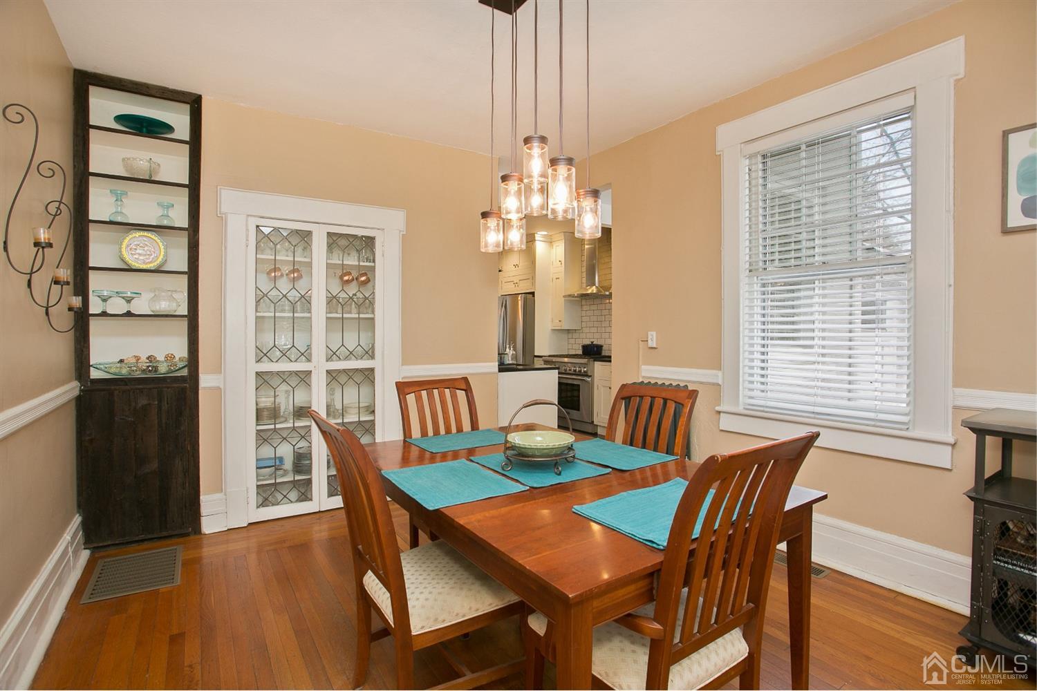 68 Rector Street Metuchen, NJ 08840 - Photo 10 of 40 a view of a dining room with furniture and wooden floor