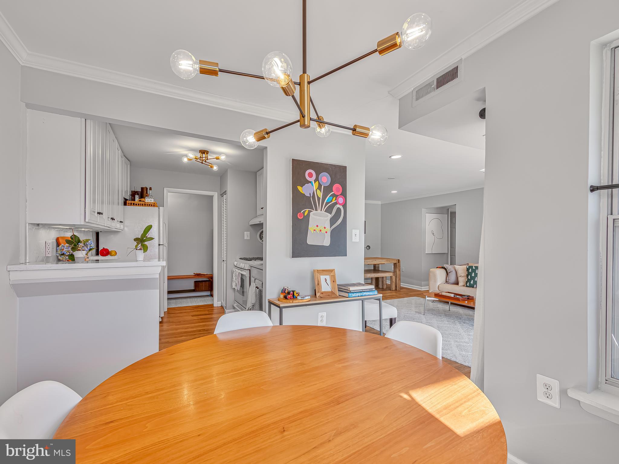 1914 Wilson Lane, Unit 202 McLean, VA 22102 - Photo 14 of 42 a bed room with a bed and a couch