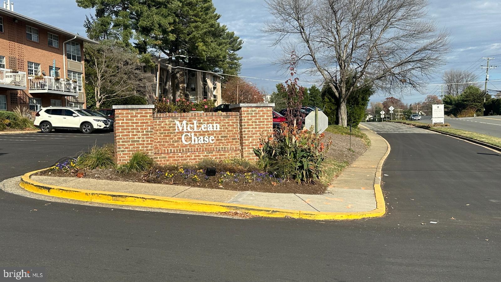 1914 Wilson Lane, Unit 202 McLean, VA 22102 - Photo 3 of 42 a view of a house with a swimming pool