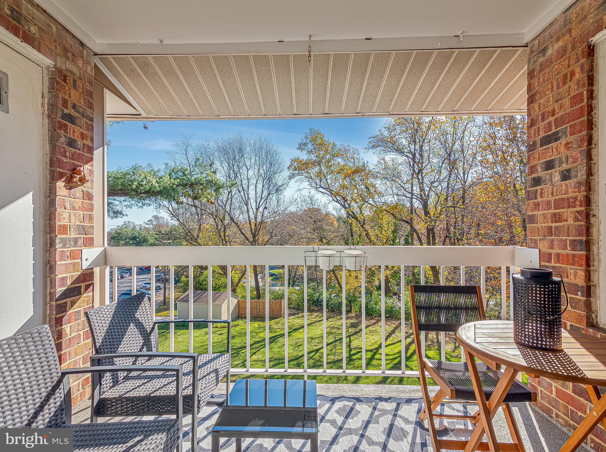 1914 Wilson Lane, Unit 202 McLean, VA 22102 - Photo 32 of 42 a view of a balcony with chairs