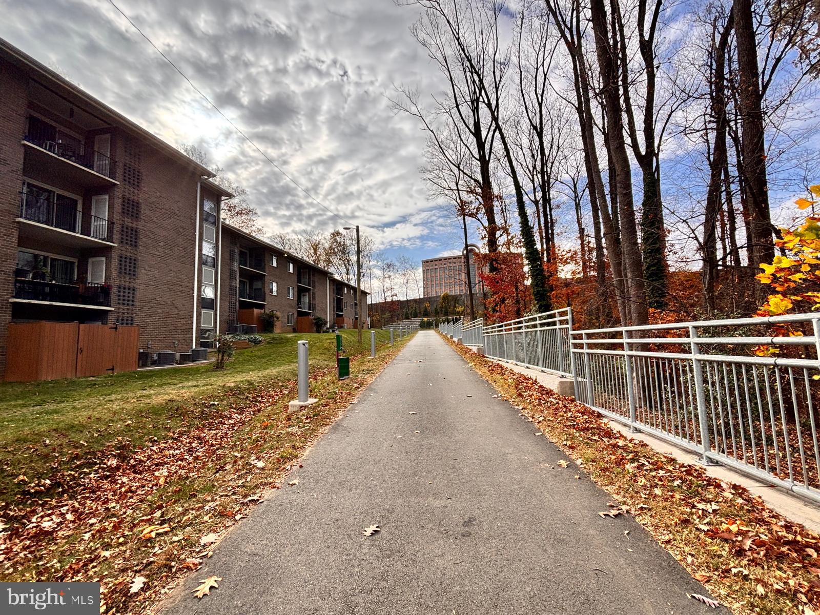 1914 Wilson Lane, Unit 202 McLean, VA 22102 - Photo 33 of 42 a view of a house with a yard