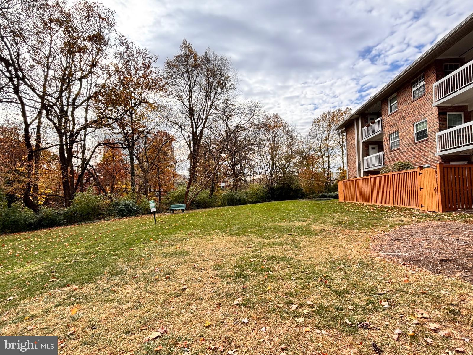 1914 Wilson Lane, Unit 202 McLean, VA 22102 - Photo 34 of 42 a backyard of a house with lots of green space