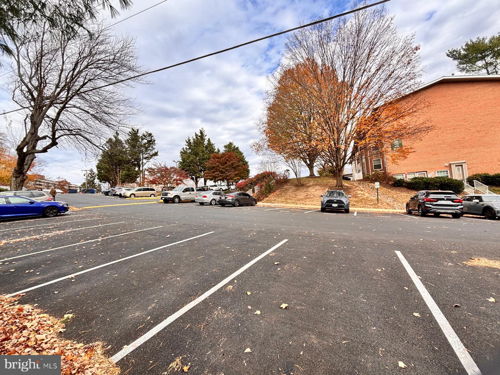 1914 Wilson Lane, Unit 202 McLean, VA 22102 - Photo 37 of 42 a view of a city street with a car parked on the road