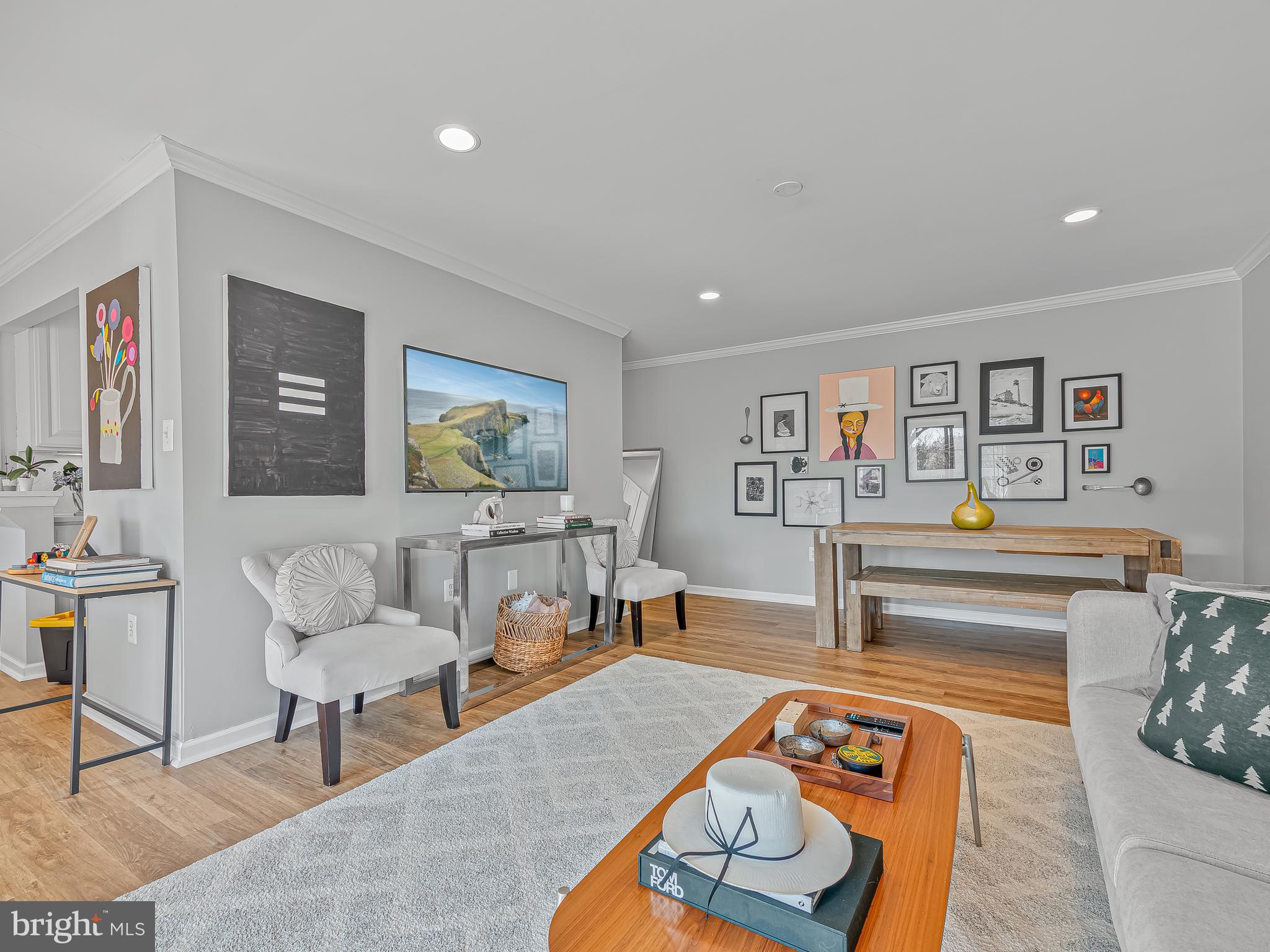 1914 Wilson Lane, Unit 202 McLean, VA 22102 - Photo 4 of 42 a living room with furniture and wooden floor