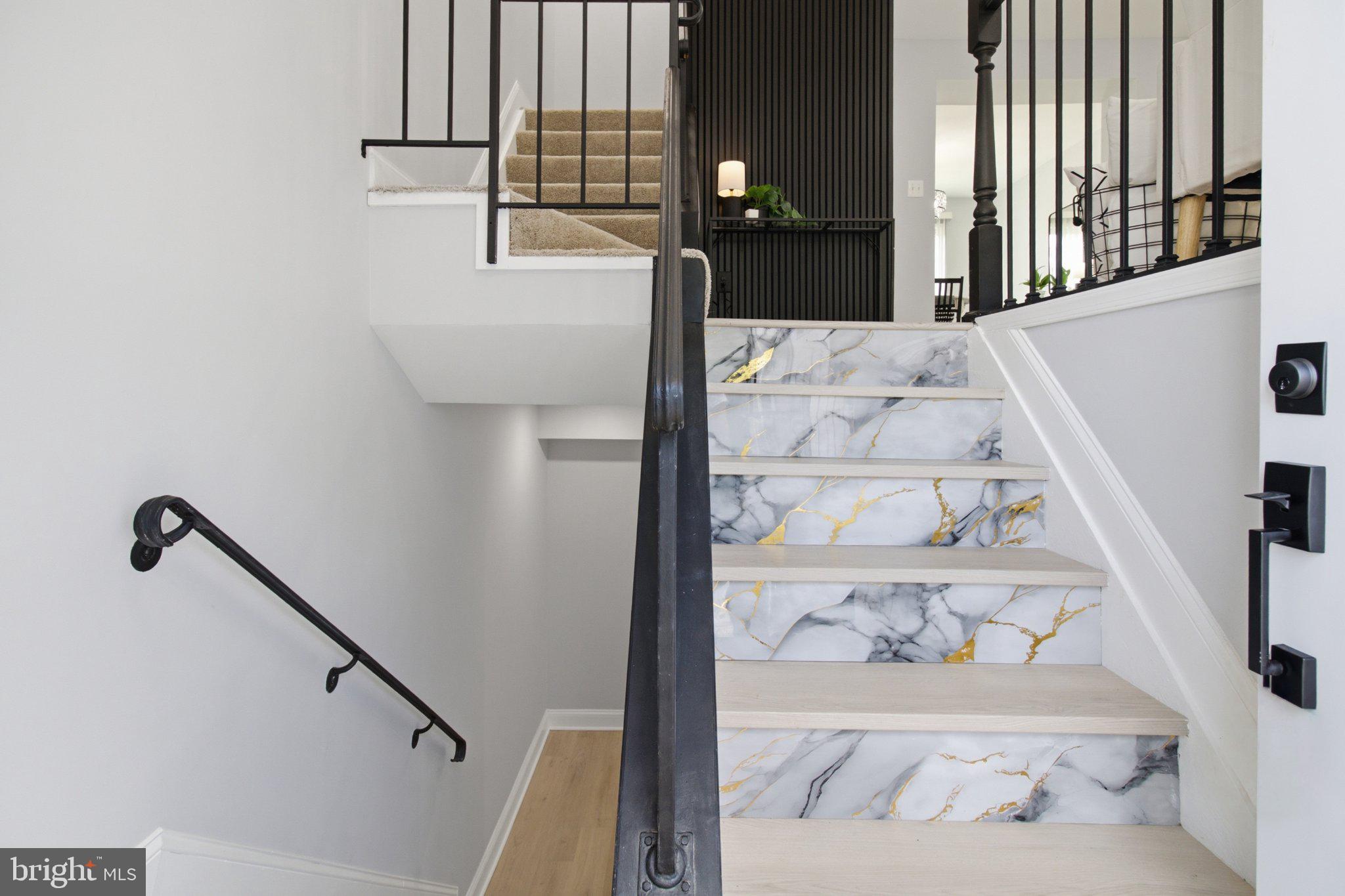 403 Kosoak Road Middle River, MD 21220 - Photo 2 of 23 Elegant marble staircase with modern railings.