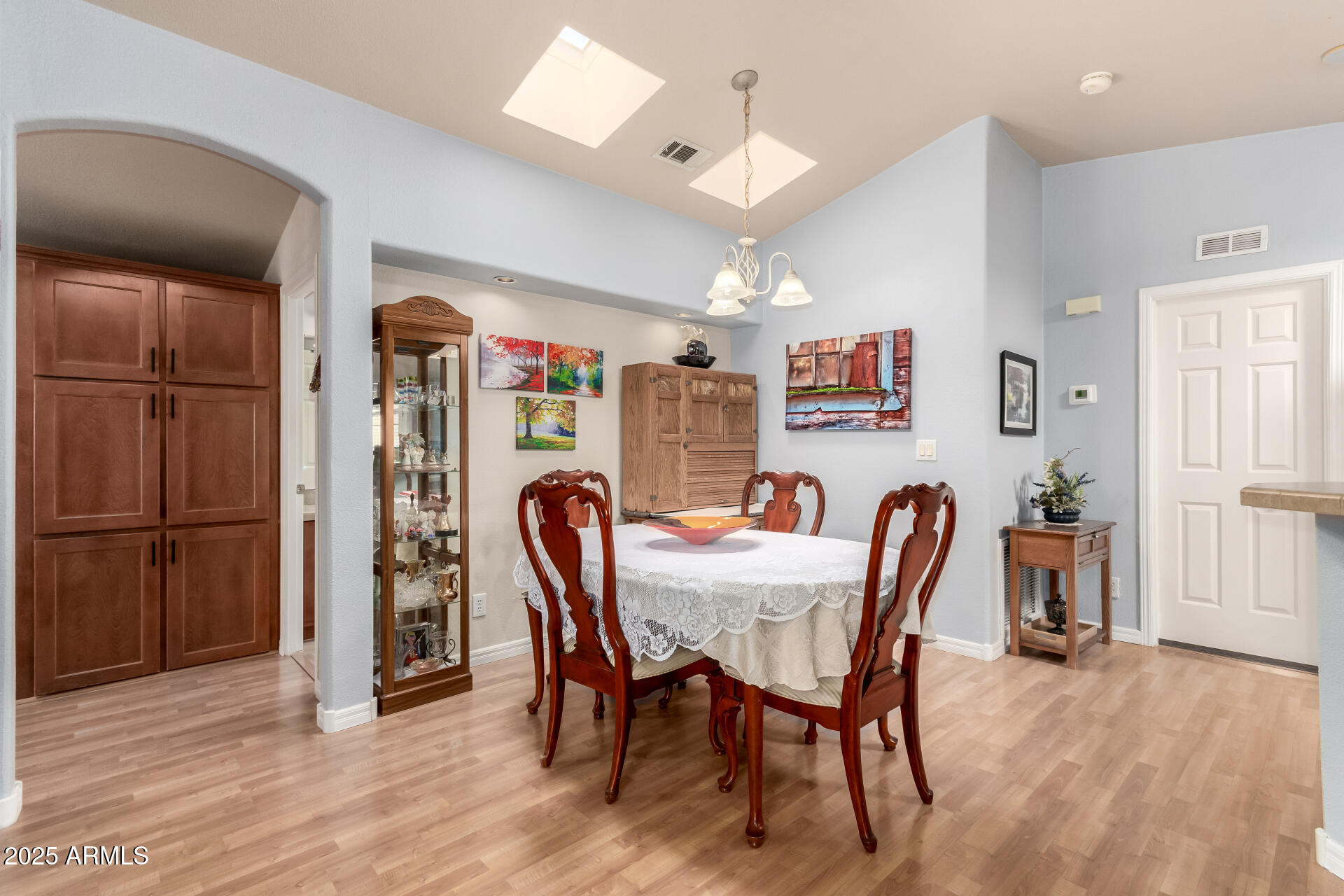 3301 South Goldfield Road, Unit 2122 Apache Junction, AZ 85119 - Photo 4 of 35 a view of a dining room with furniture and a window