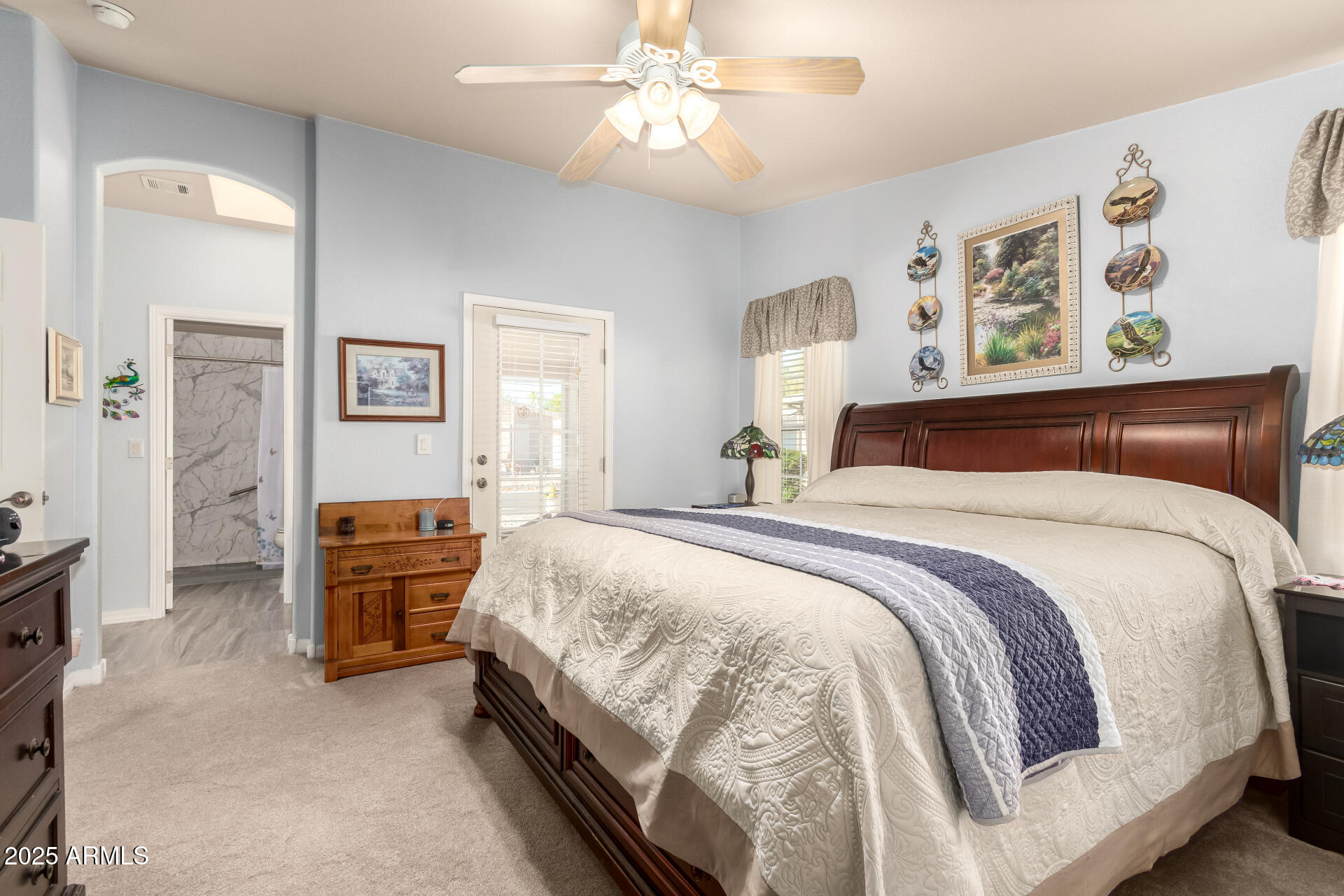 3301 South Goldfield Road, Unit 2122 Apache Junction, AZ 85119 - Photo 6 of 35 a bedroom with bed and window