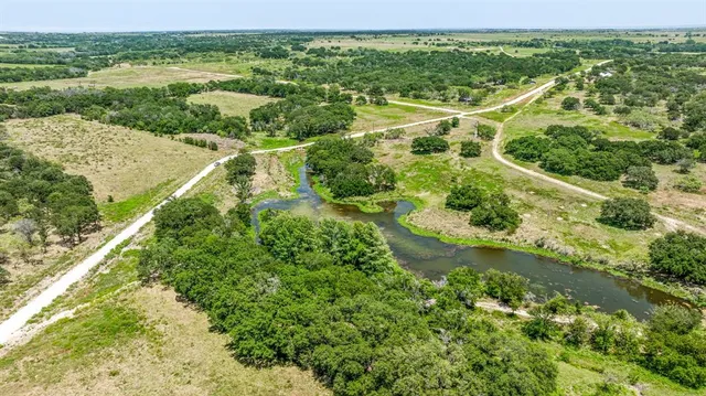 a view of backyard with green space