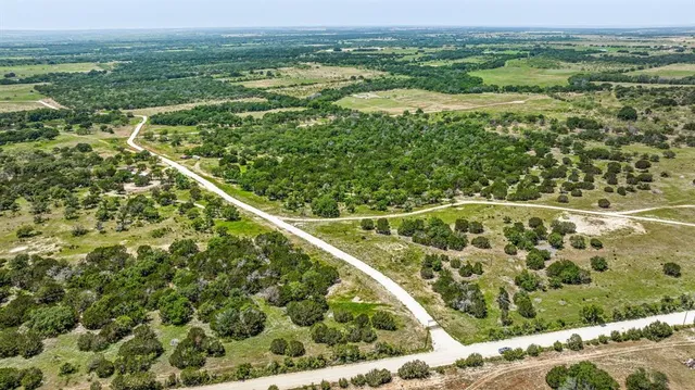 a view of a yard with an outdoor space
