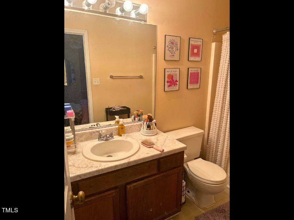 4135 Kaplan Drive Raleigh, NC 27606 - Photo 13 of 20 2nd Floor Bath 1