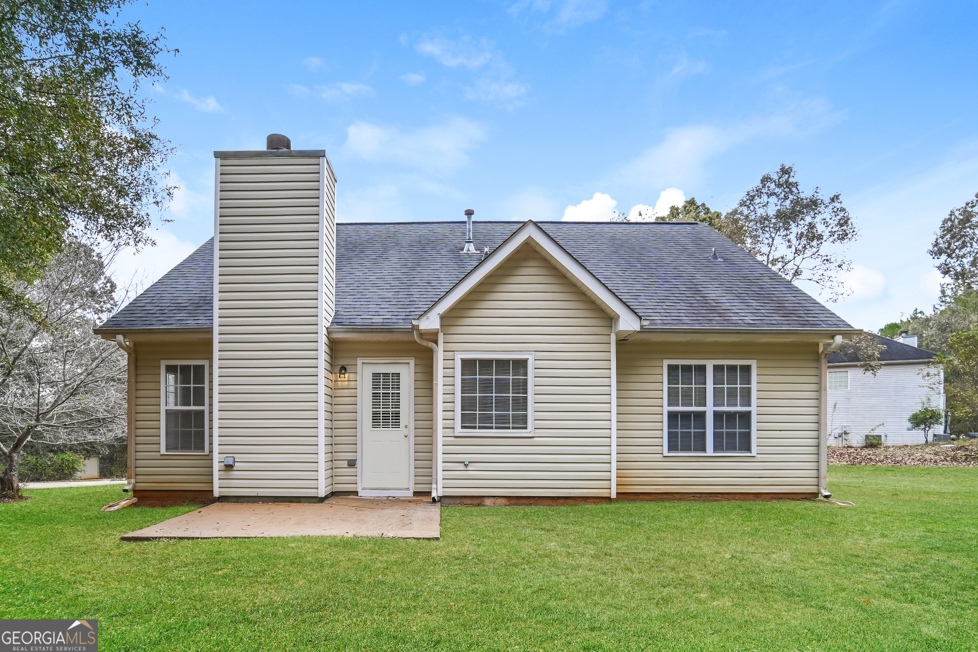 60 Freeman Way Covington, GA 30016 - Photo 14 of 17 a view of a house with a backyard