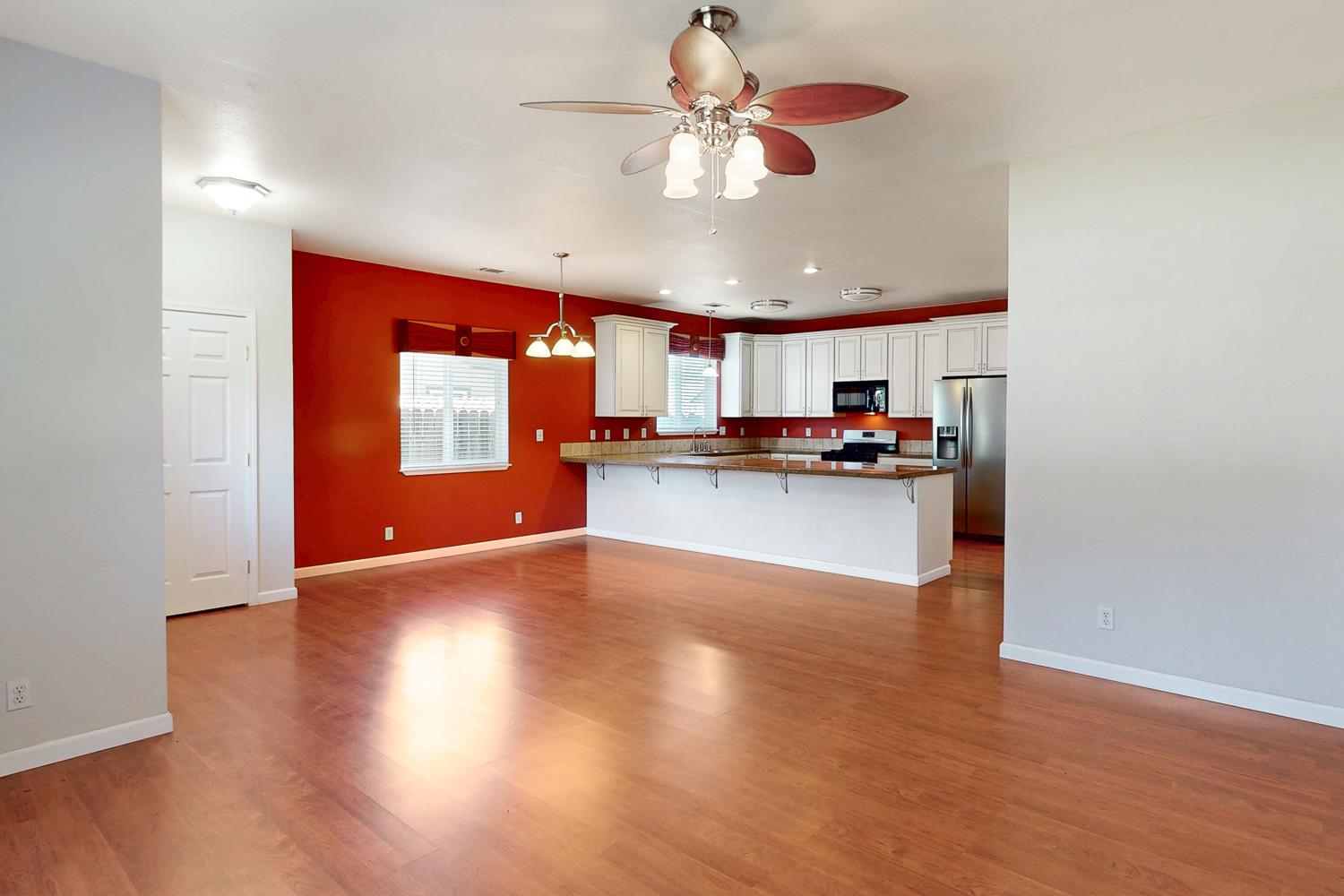 1835 Magnolia Street Gridley, CA 95948 - Photo 15 of 53 a view of a kitchen with a sink and microwave