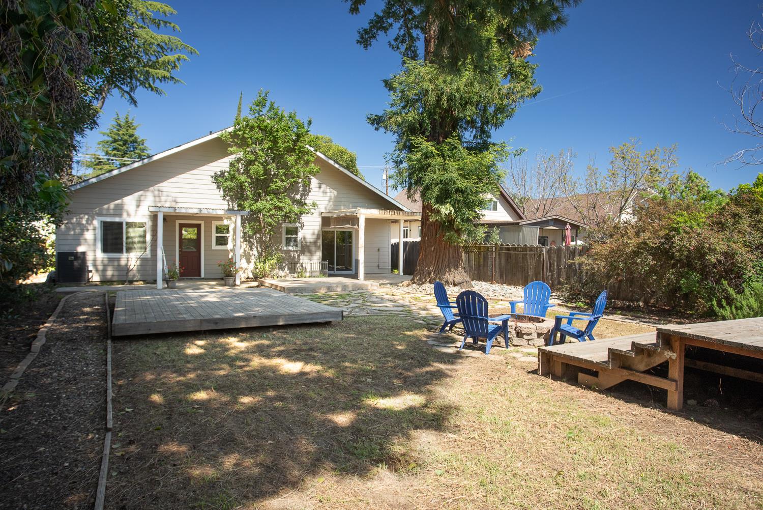 1835 Magnolia Street Gridley, CA 95948 - Photo 22 of 53 a view of a house with backyard and sitting area