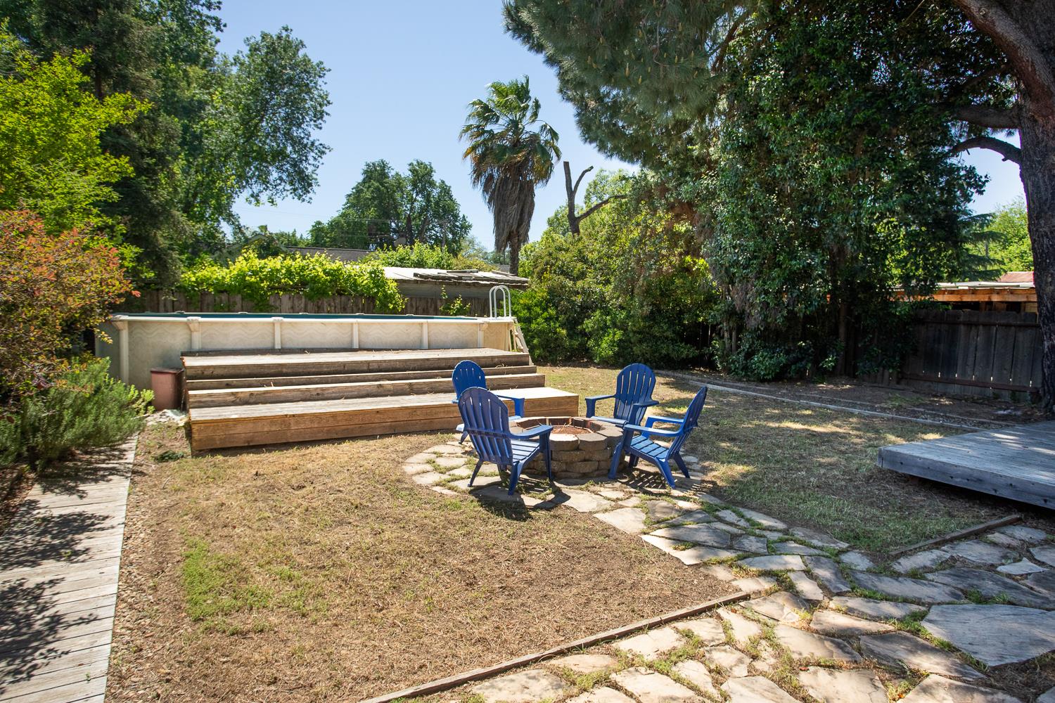 1835 Magnolia Street Gridley, CA 95948 - Photo 31 of 53 a bench sitting in middle of a yard