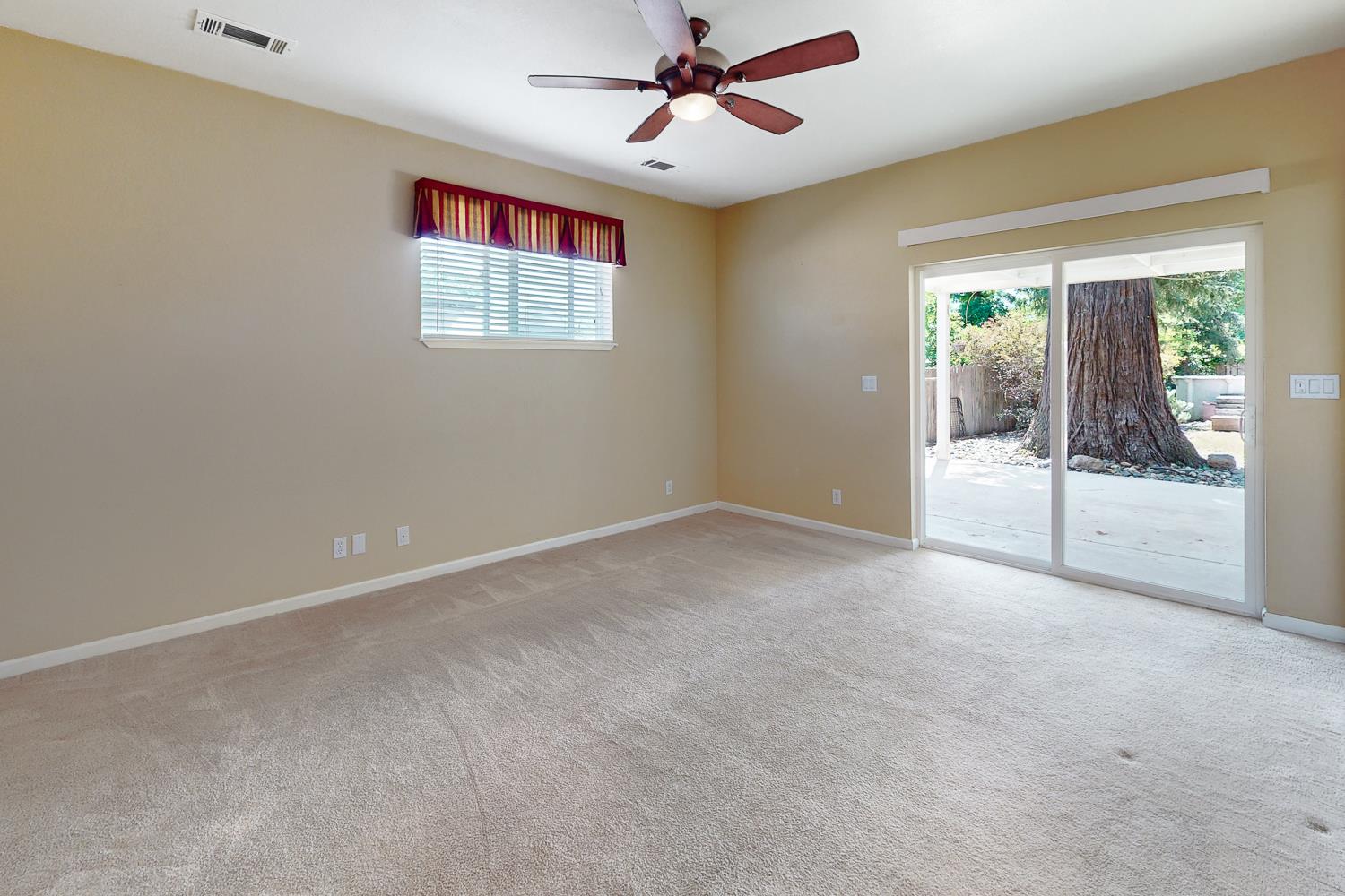 1835 Magnolia Street Gridley, CA 95948 - Photo 33 of 53 an empty room with windows and fan