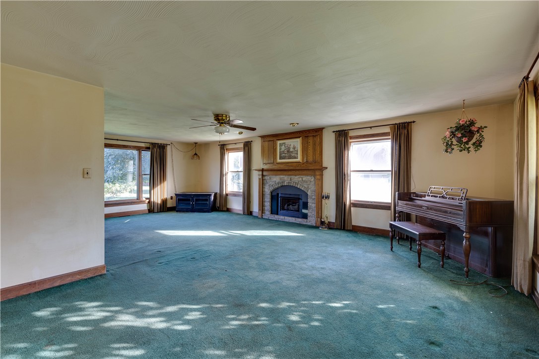 2480 Ridge Road Ontario, NY 14519 - Photo 9 of 37 Spacious Living room with Gas Fireplace
