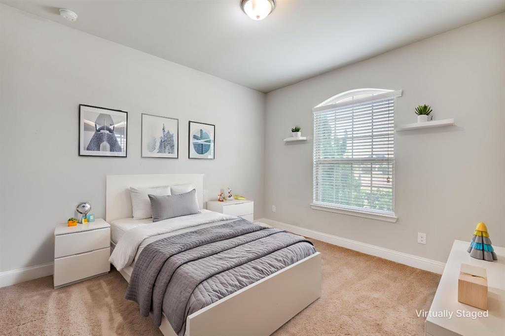 6117 Hall Road Frisco, TX 75034 - Photo 17 of 32 Bedroom featuring light colored carpet and baseboards