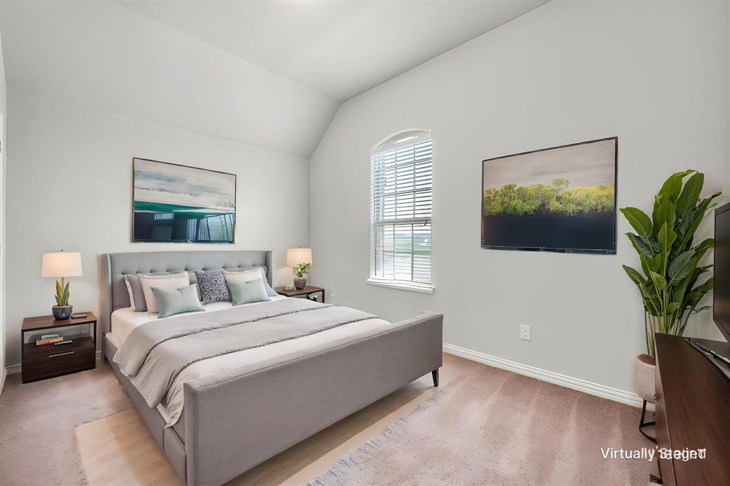 6117 Hall Road Frisco, TX 75034 - Photo 22 of 32 Bedroom with lofted ceiling and light carpet
