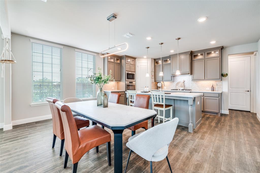 6117 Hall Road Frisco, TX 75034 - Photo 8 of 32 Dining room featuring dark wood finished floors and recessed lighting