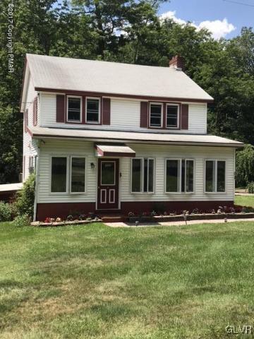 259 Wieboldt Road Cresco, PA 18326 - Photo 1 of 16 a front view of a house with a yard