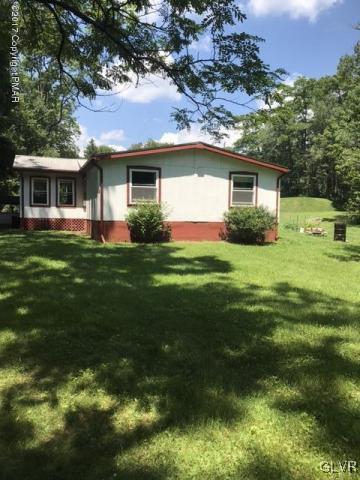 259 Wieboldt Road Cresco, PA 18326 - Photo 11 of 16 a front view of house with yard and green space