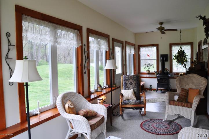259 Wieboldt Road Cresco, PA 18326 - Photo 6 of 16 a room with furniture and a large window