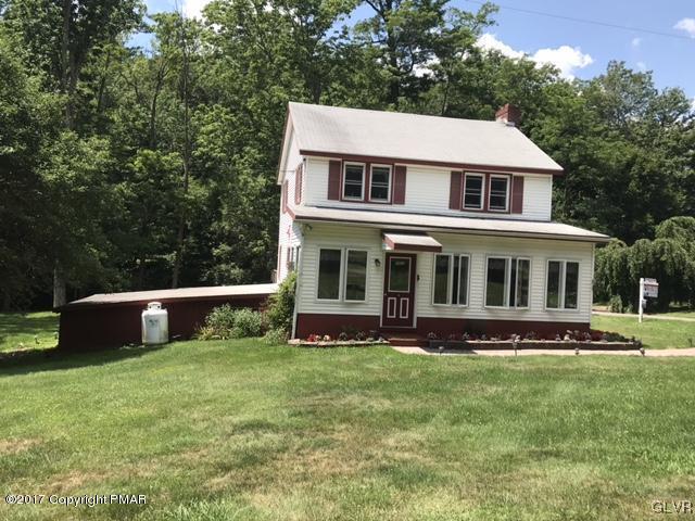 259 Wieboldt Road Cresco, PA 18326 - Photo 8 of 16 a front view of house with yard and green space