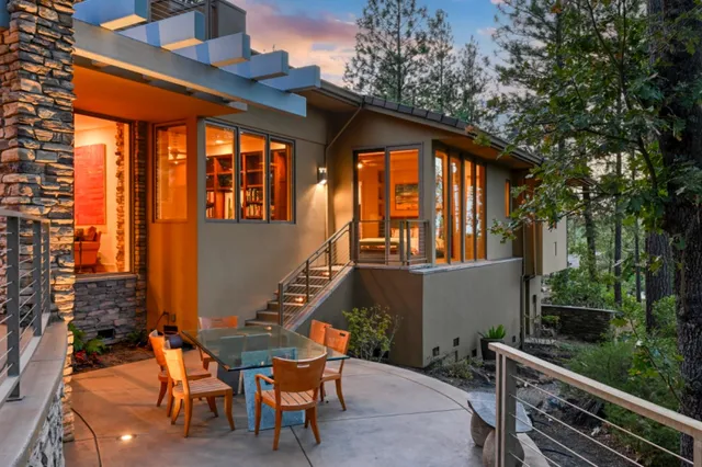 a bathroom with a granite countertop sink shower and a mirror