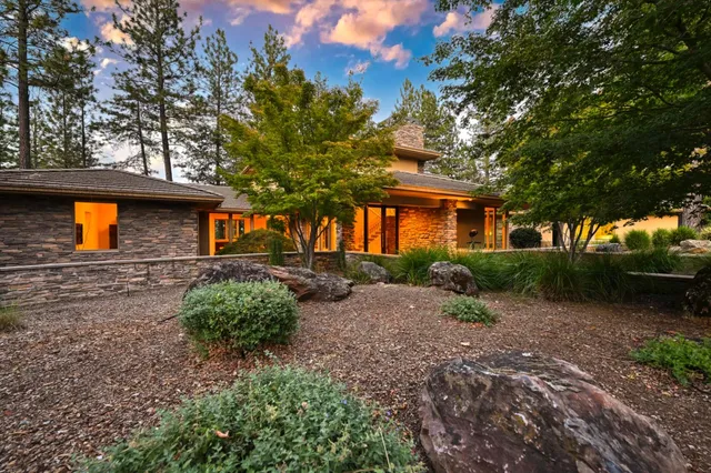 a view of front door and potted plants