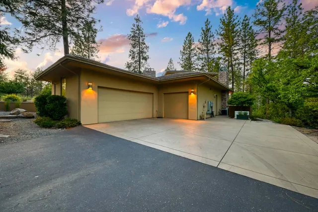 a house view with a garden space