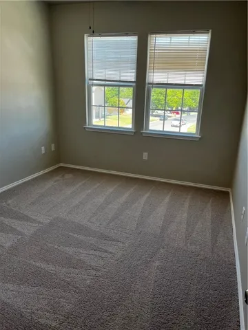 a bathroom with a granite countertop toilet a sink and bathtub