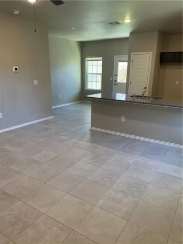 a bathroom with a toilet and a sink