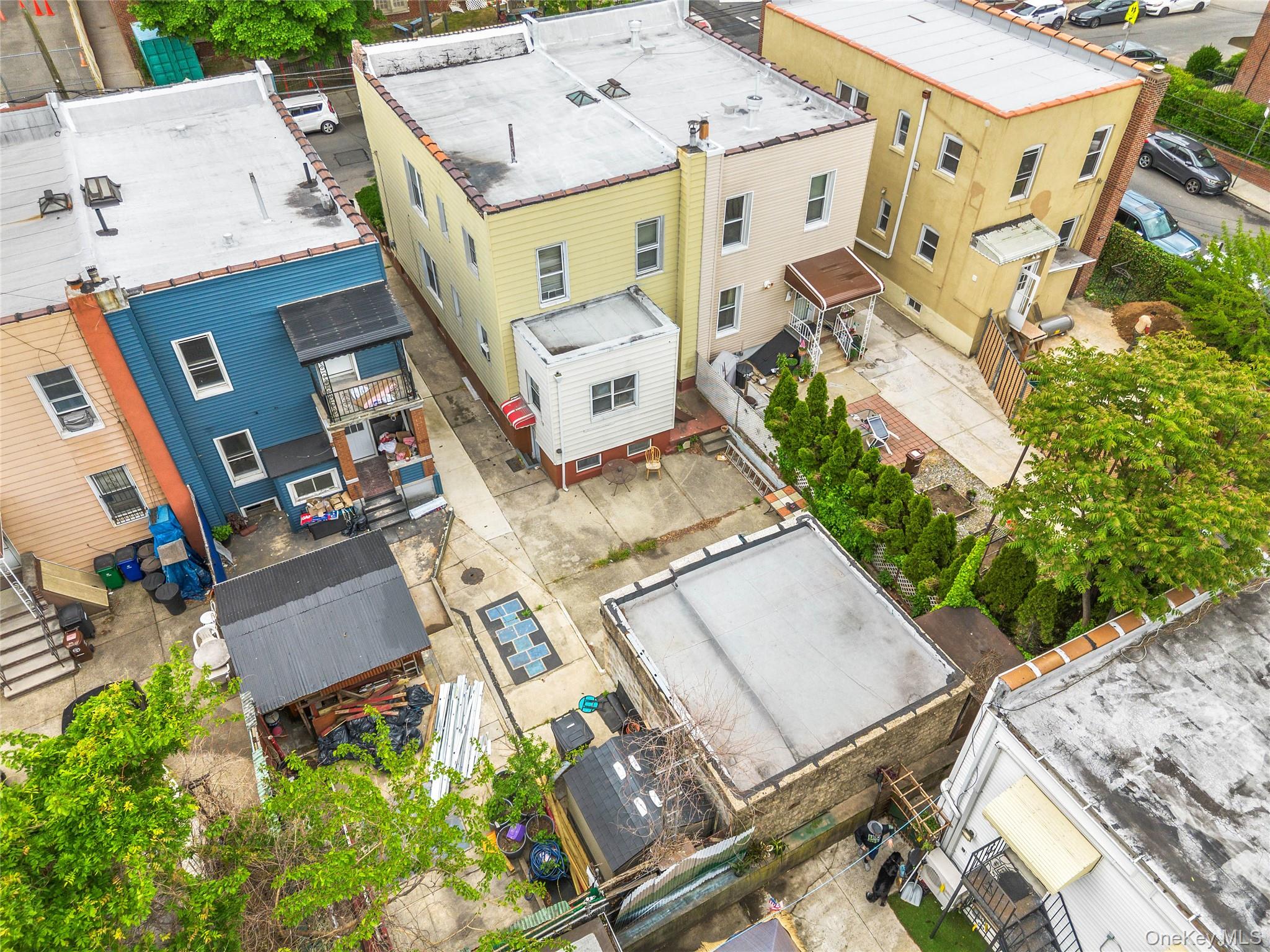 37-07 20th Road Queens, NY 11105 - Photo 21 of 24 an aerial view of a house with a backyard
