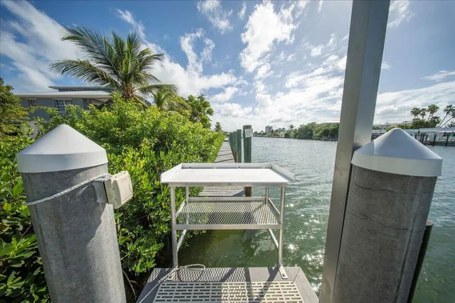 a spacious bedroom with a bed couch and a window