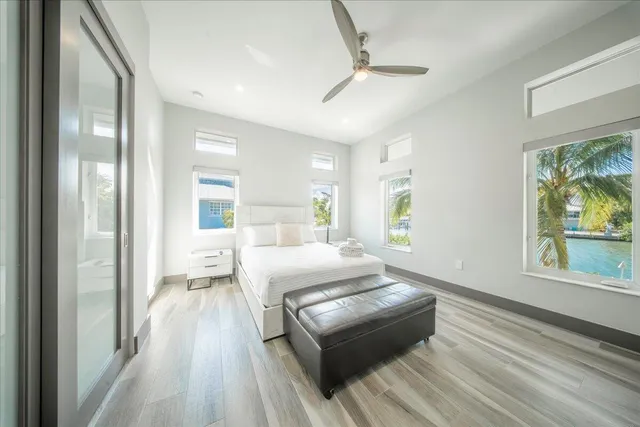 an aerial view of a house with a lake view