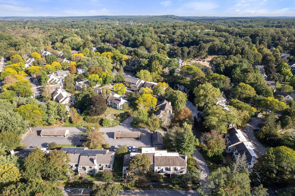 22 Concord Greene, Unit 2 Concord, MA 01742 - Photo 30 of 36 an aerial view of a city with lots of residential buildings