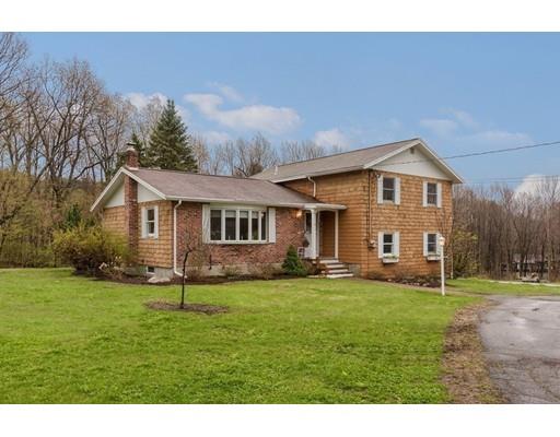 74 Hobbs Road Princeton, MA 01541 - Photo 1 of 27 a front view of a house with a yard