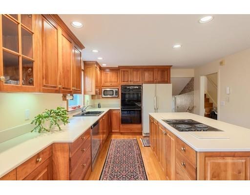 74 Hobbs Road Princeton, MA 01541 - Photo 15 of 27 a kitchen with stainless steel appliances kitchen island granite countertop a stove a sink and a refrigerator