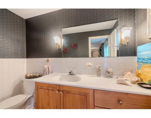 74 Hobbs Road Princeton, MA 01541 - Photo 19 of 27 a bathroom with a sink and a mirror