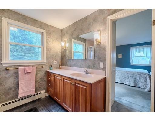 74 Hobbs Road Princeton, MA 01541 - Photo 23 of 27 a bathroom with a sink a mirror and a bathtub