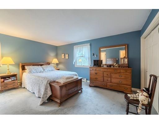 74 Hobbs Road Princeton, MA 01541 - Photo 24 of 27 a bedroom with a bed and furniture