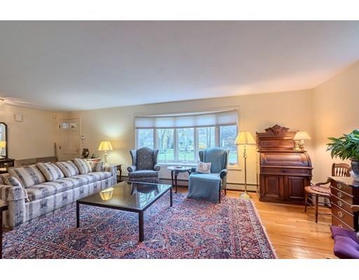 74 Hobbs Road Princeton, MA 01541 - Photo 10 of 27 a living room with furniture a fireplace and a large window