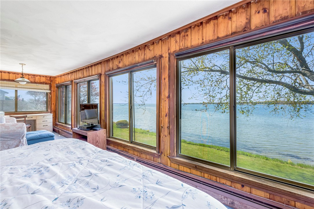 174 Andrew Comstock Road Warwick, RI 02886 - Photo 15 of 40 Master Bedroom with walls of glass on three sides