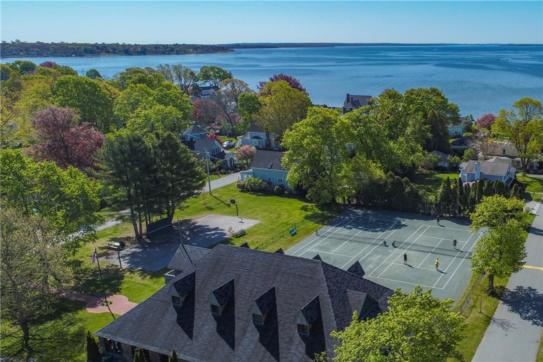 174 Andrew Comstock Road Warwick, RI 02886 - Photo 31 of 40 Drone on neighborhood clay courts!