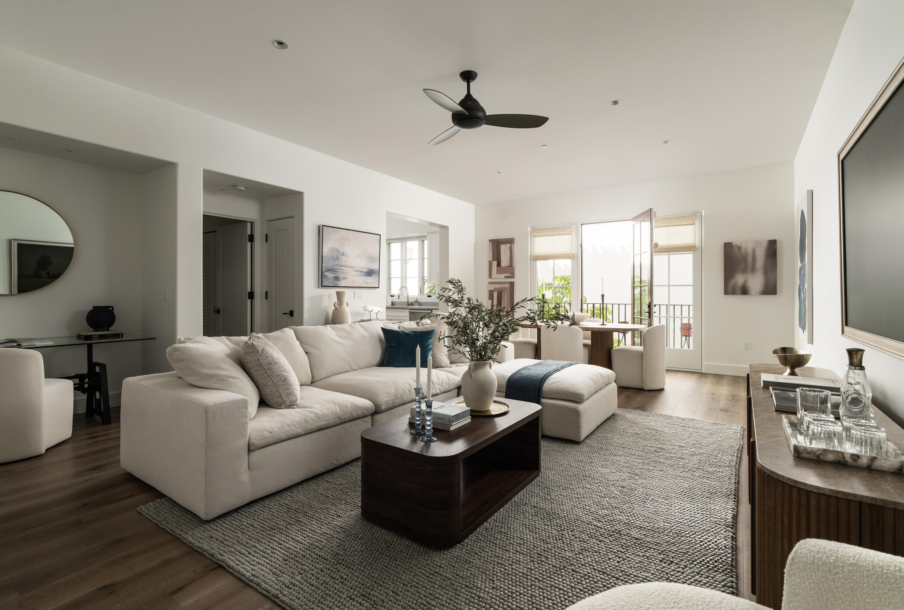 18 West Victoria Street, Unit 206 Santa Barbara, CA 93101 - Photo 2 of 18 a living room with furniture or couch and a wooden floor