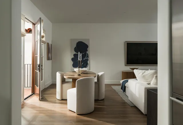 a living room with a couch and a flat screen tv